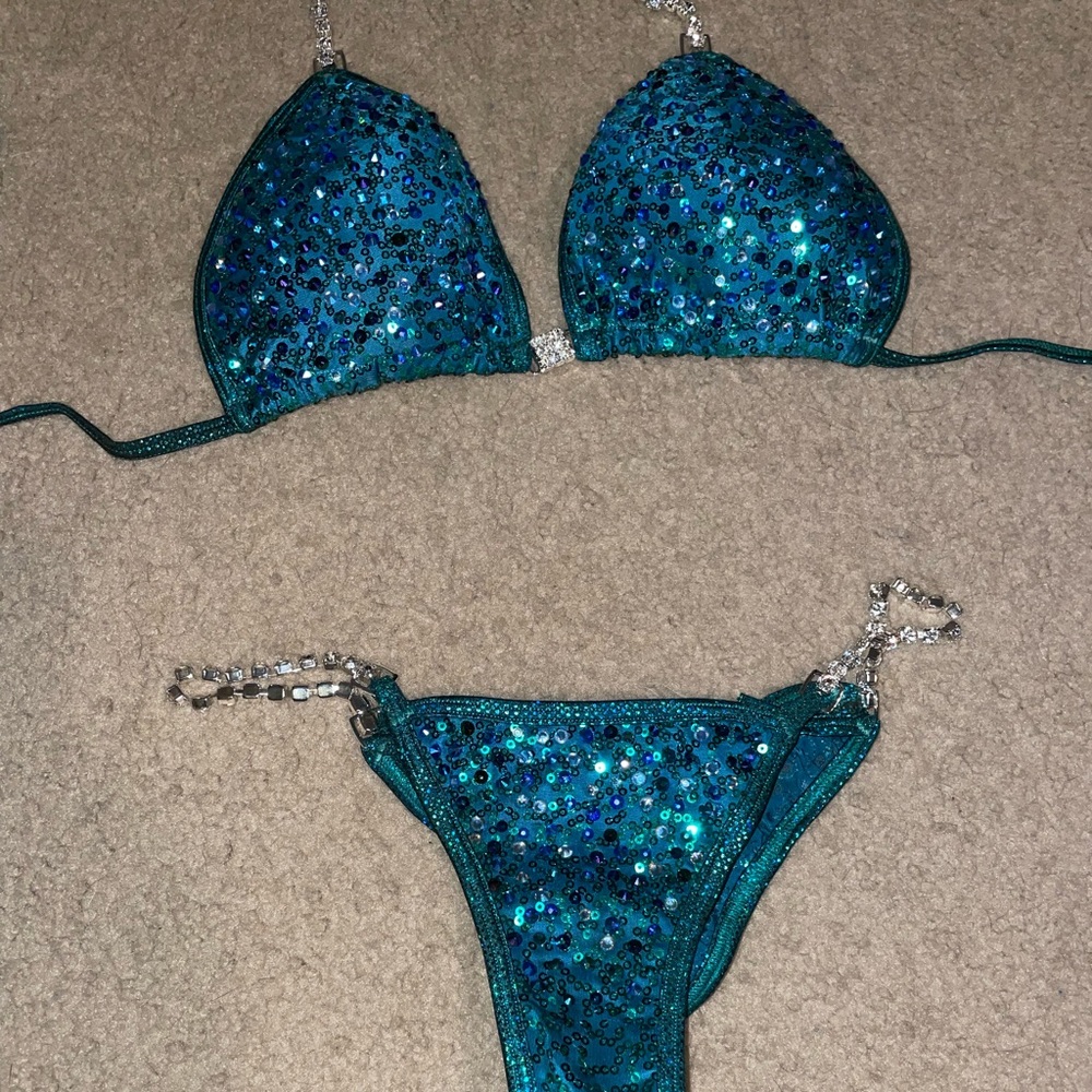 Angel Competition Bikini in sequined teal fabric.
